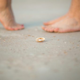 Melbourne beach photographer photographs engaged couple on the beach at Smyrna dunes park