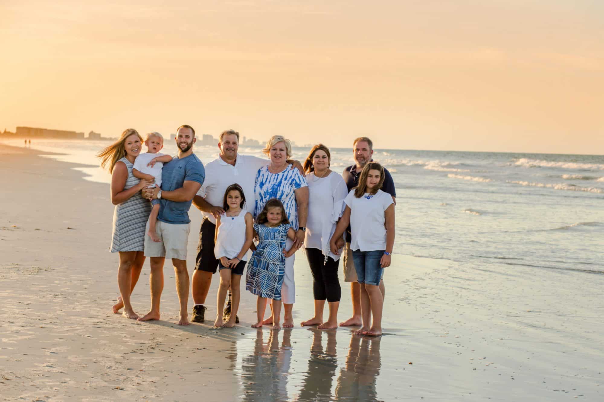 Family portrait in blue, beach portrait, photo by the ocean, lighthouse point park, ormond beach area photographer, new smyrna beach photographer, vacation photos by the beach
