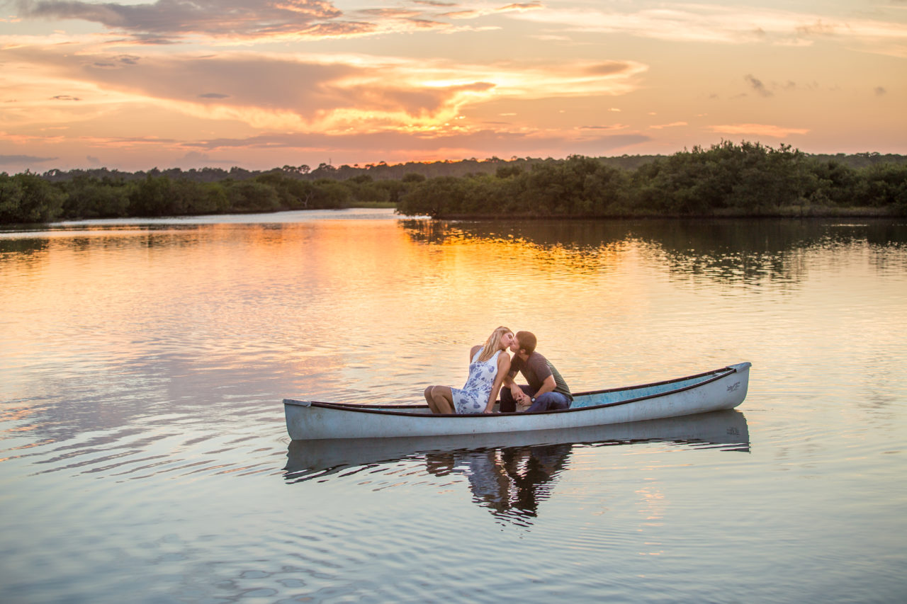 Canoe engagement photos, sunset engagement photos, new smyrna beach wedding photographer, ormond beach engagement photos