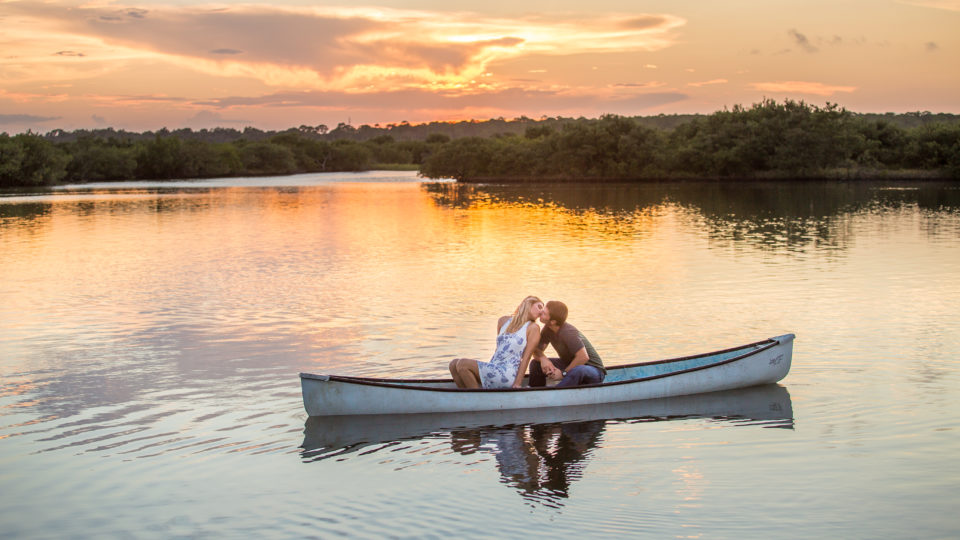 Canoe engagement photos, sunset engagement photos, new smyrna beach wedding photographer, ormond beach engagement photos