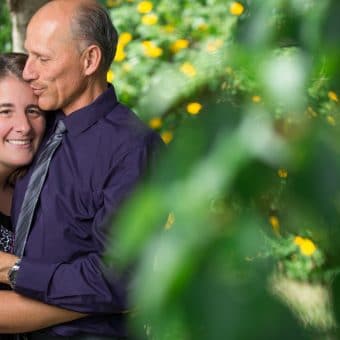 Spring portrait of couple photographed by a local Orlando engagement photographer for a spring family portrait session