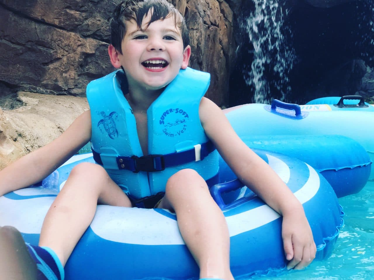 Orlando family photograph at Typhoon Lagoon in the lazy river