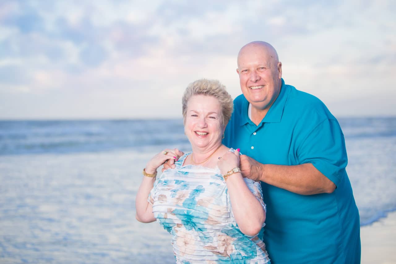 St. Augustine family photographer documents family vacation on the beach at sunset