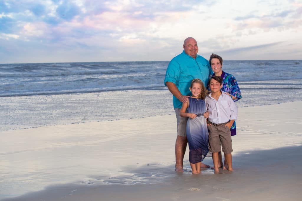 St. Augustine family photographer documents family vacation on the beach at sunset
