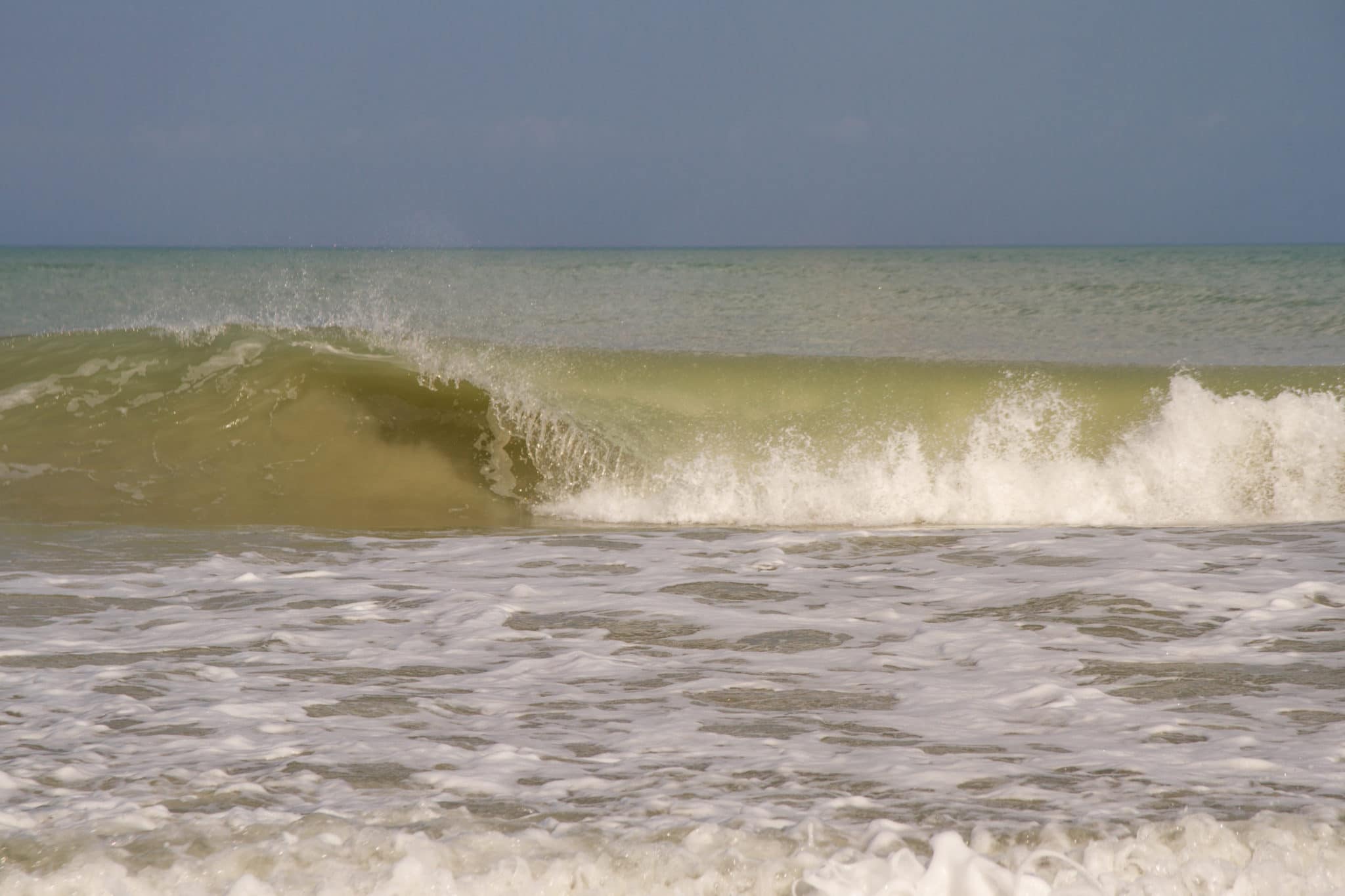 Waves crashing by vero beach photographer