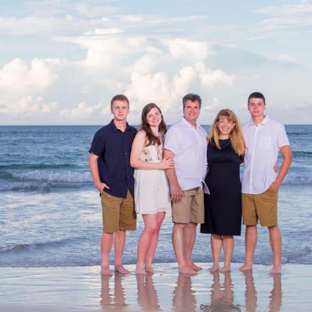 family beach photo in Florida by a family beach photographer